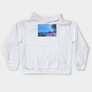 View from Toompea of Lower Town, Old Town with St. Olai's Church or Oleviste Kirik, and the towers of the city wall at dusk, Tallinn, Estonia, Europe Kids Hoodie